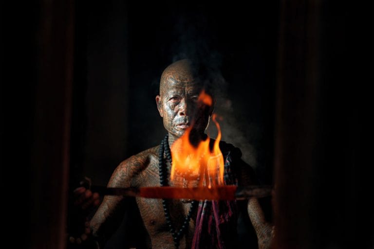 Spellbound Chronicles 15 of asian old man with tatooes posing with 2025 01 29 14 49 31 utc