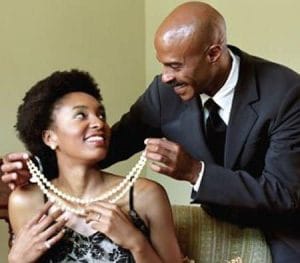 How Kelvin Kimani Found Healing Through a Powerful Traditional Healer in Kenya 2 man giving woman a gift1 t580