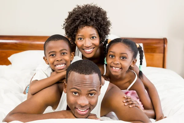 Spellbound Chronicles 12 depositphotos 97051488 stock photo happy family lying in bed