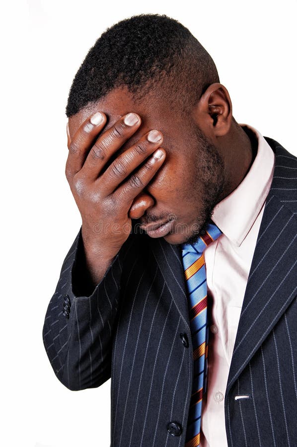 Spellbound Chronicles 3 frustrated black man closeup picture suit holding his hand his face sadness white background 36048692