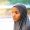 Pensive serious young black muslim woman wearing a hijab looking away