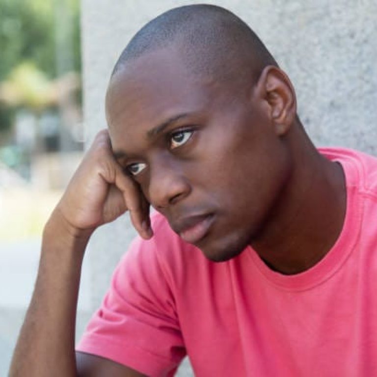 Poor african american man outdoor in the summer