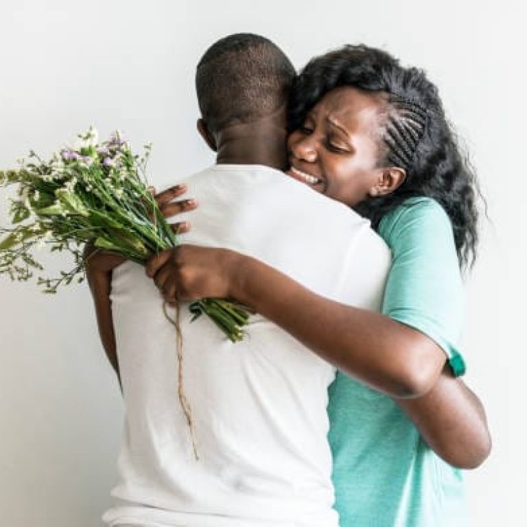 Wife receives a bouquet of flowers from her husband