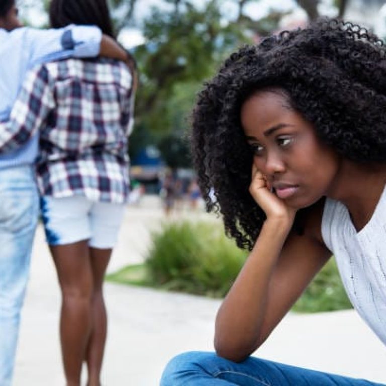 Lonesome black woman without boyfriend outdoors in the city