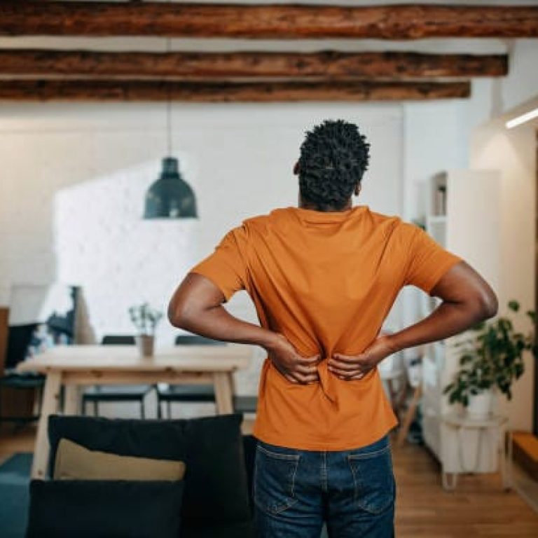 Young African-American man having pain