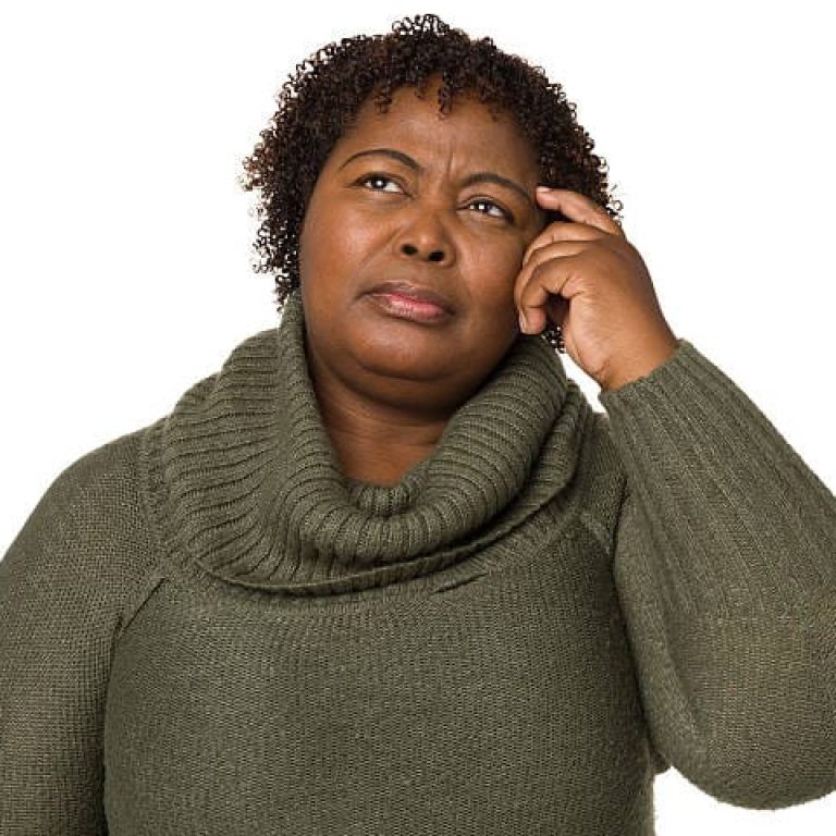 Portrait of a mature woman on a white background.
