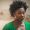 Young African American woman looking very depressed, disappointed and thoughtful.