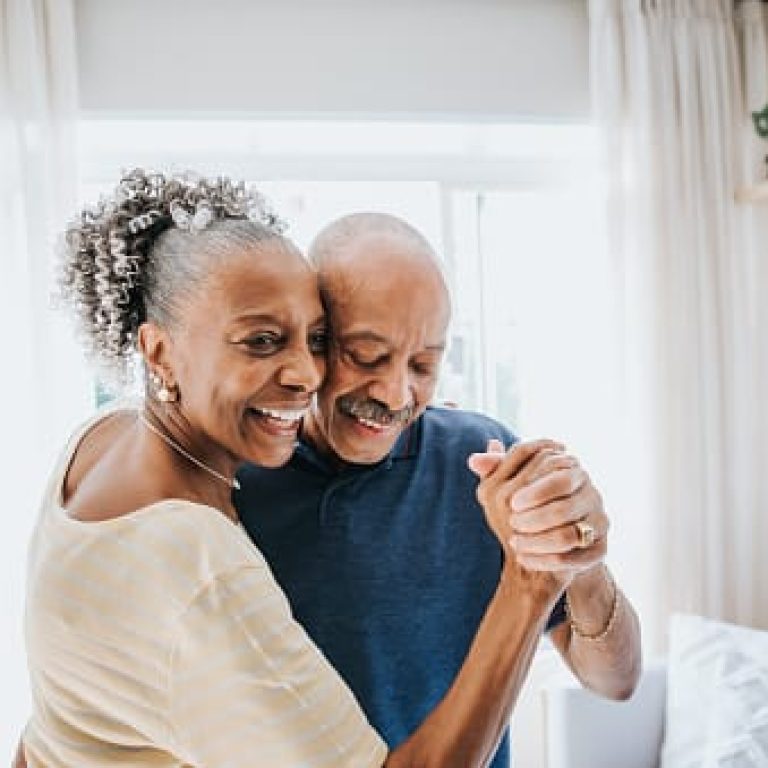 senior couple dancing together
